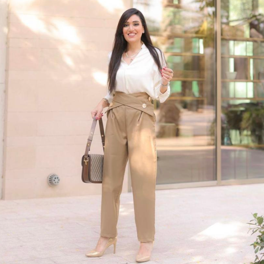 high-waist pleated pants with crossover button detail - Radish