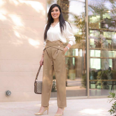 high-waist pleated pants with crossover button detail - Radish