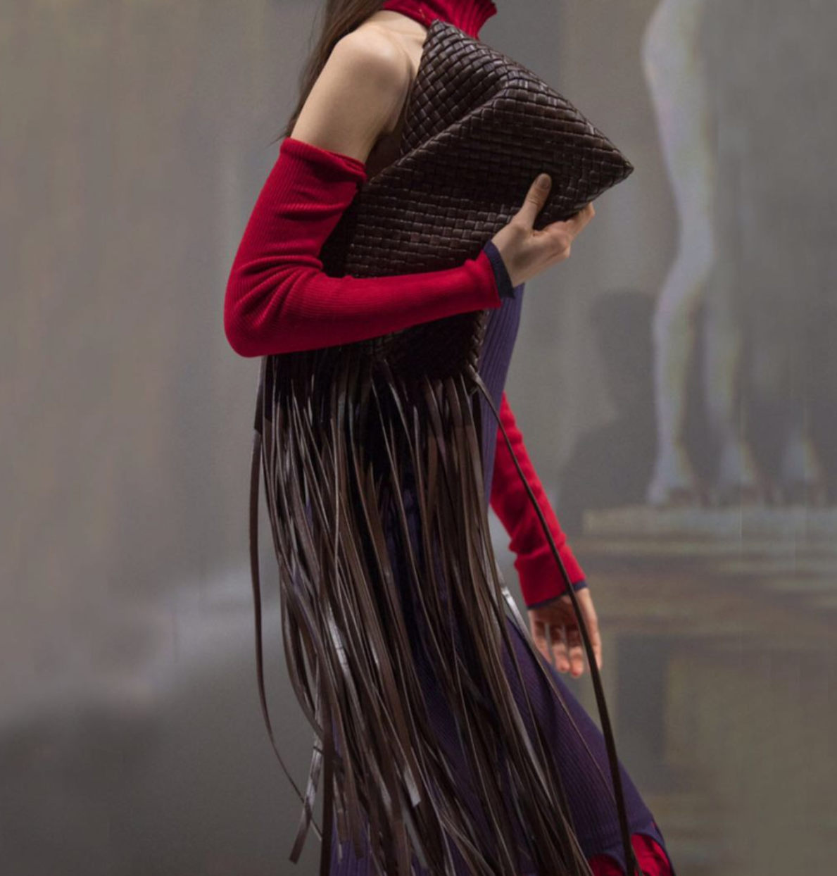 woven leather clutch with fringe detail – Aelueua