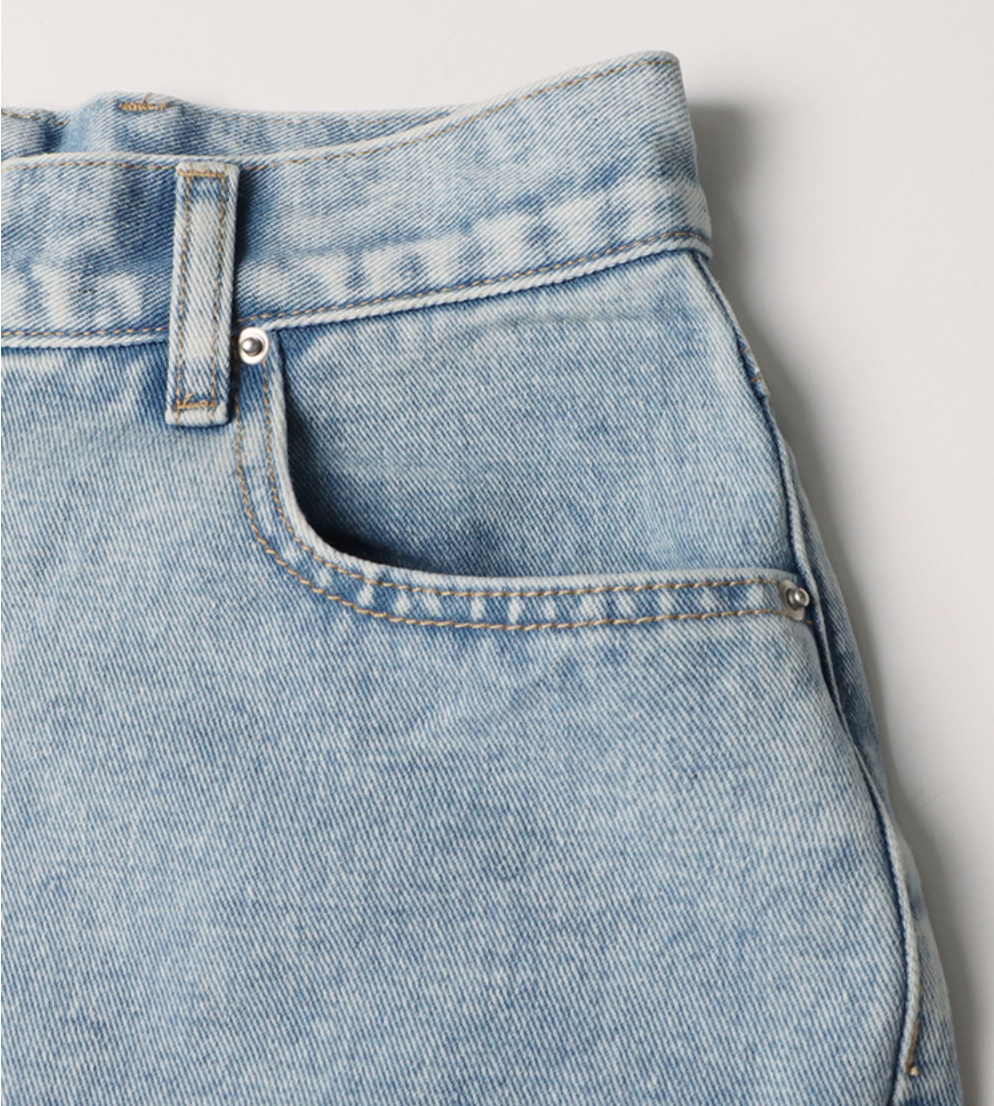 high-waist tapered jeans with exaggerated side flaps - Eireen