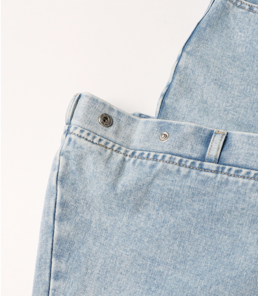 high-waist tapered jeans with exaggerated side flaps - Eireen
