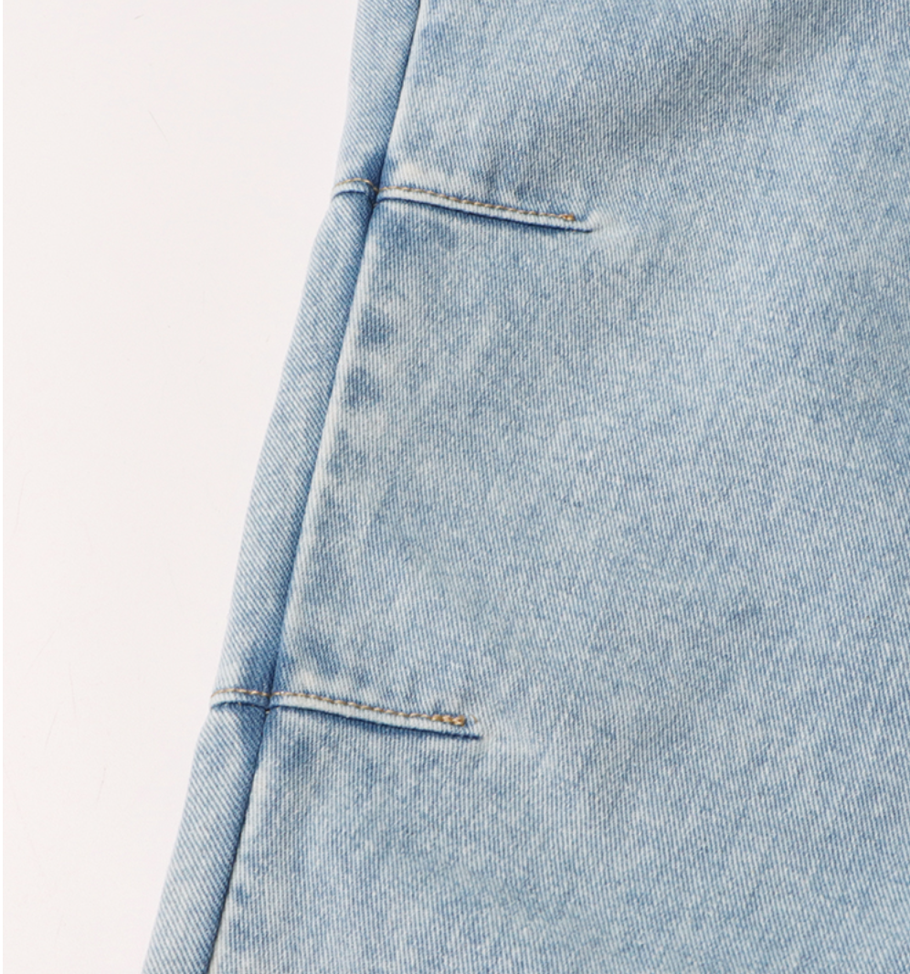 high-waist tapered jeans with exaggerated side flaps - Eireen