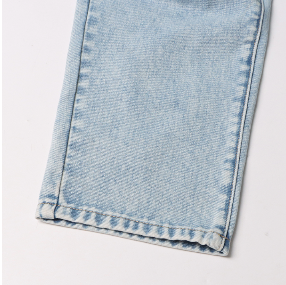 high-waist tapered jeans with exaggerated side flaps - Eireen