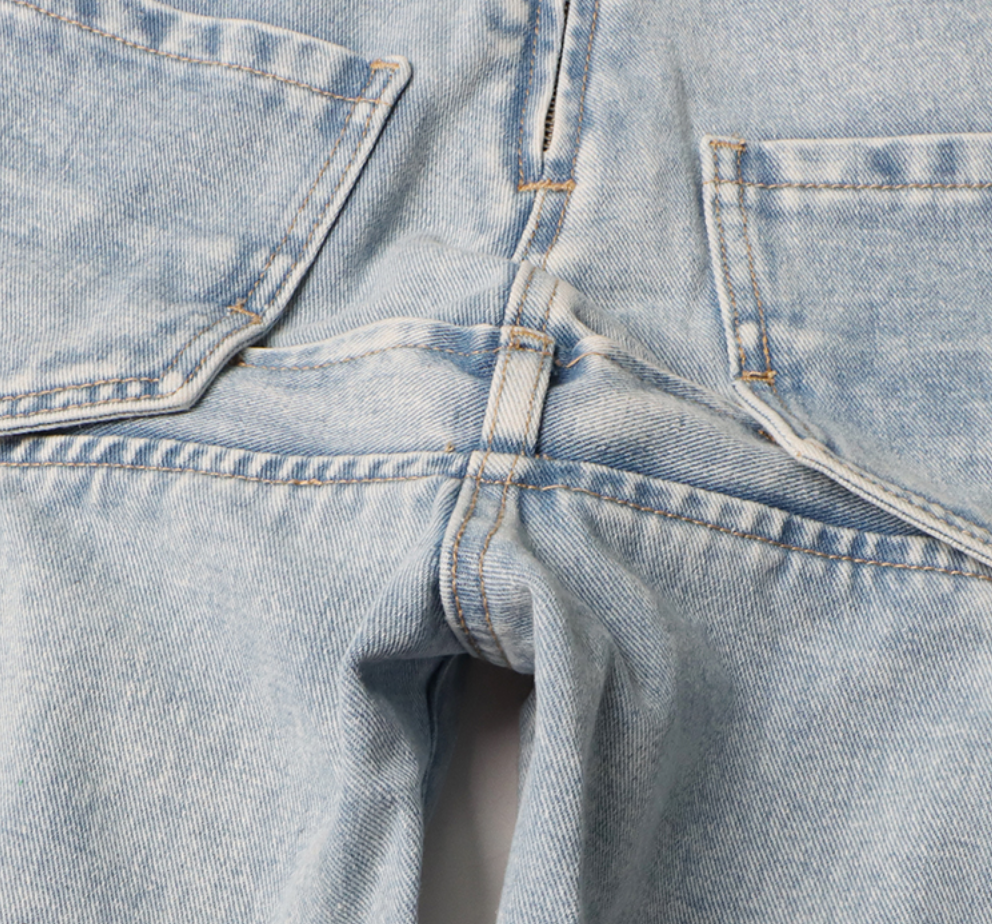 high-waist tapered jeans with exaggerated side flaps - Eireen