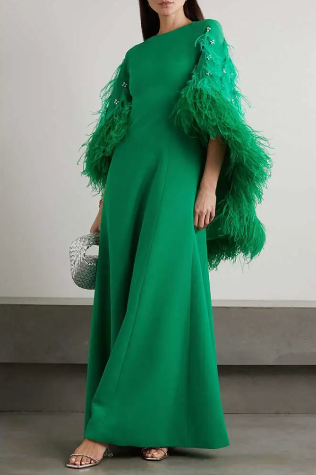 feather-embellished cape gown in emerald – Svadhi