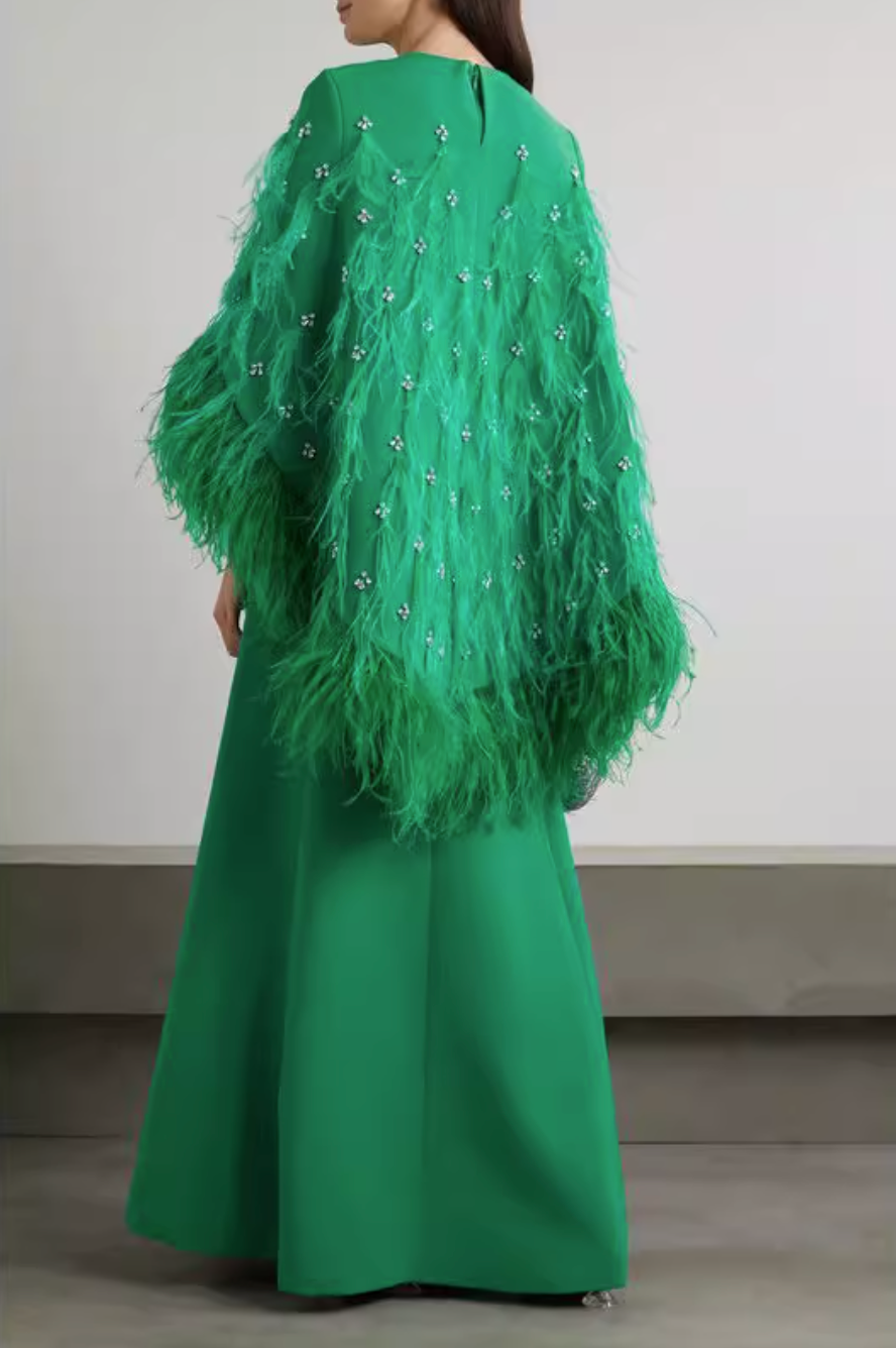 feather-embellished cape gown in emerald – Svadhi