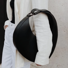 crescent-shaped leather shoulder bag with adjustable strap - Felberta