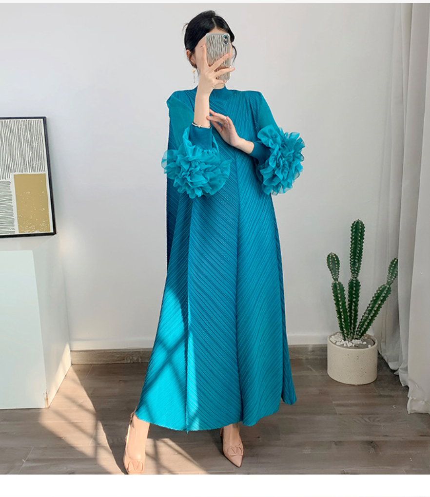 Pleated gown with 3D floral sleeves – Gerdie