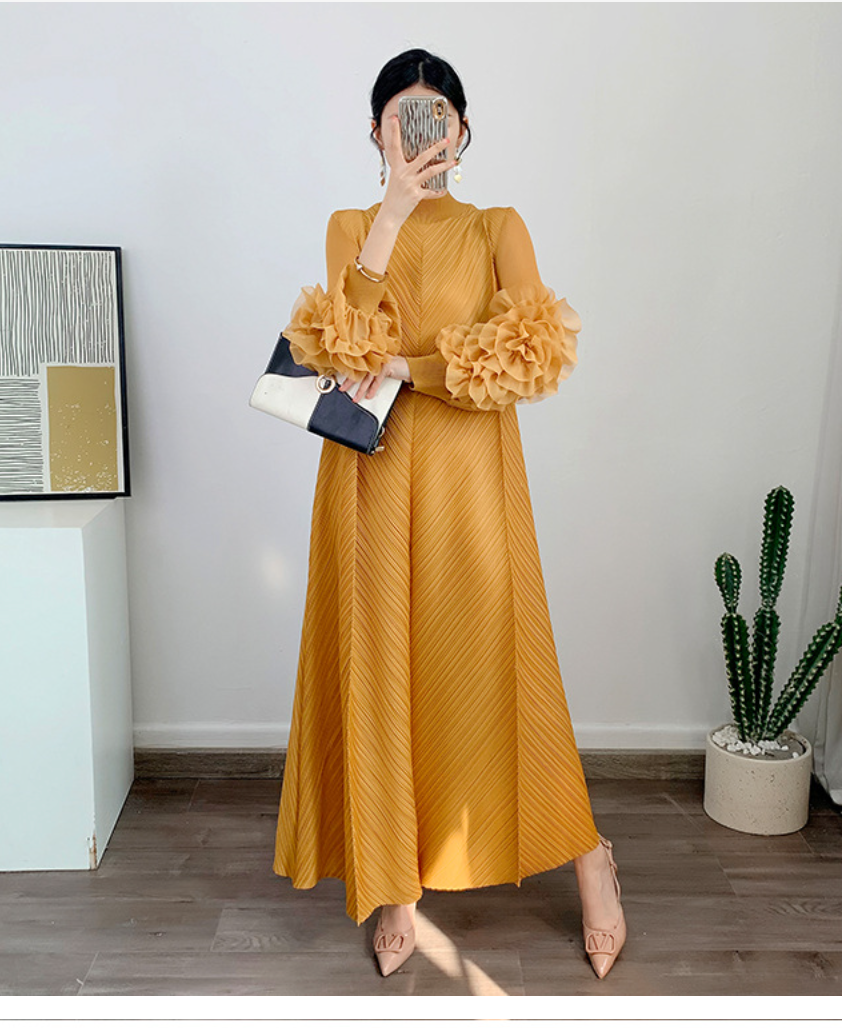 Pleated gown with 3D floral sleeves – Gerdie