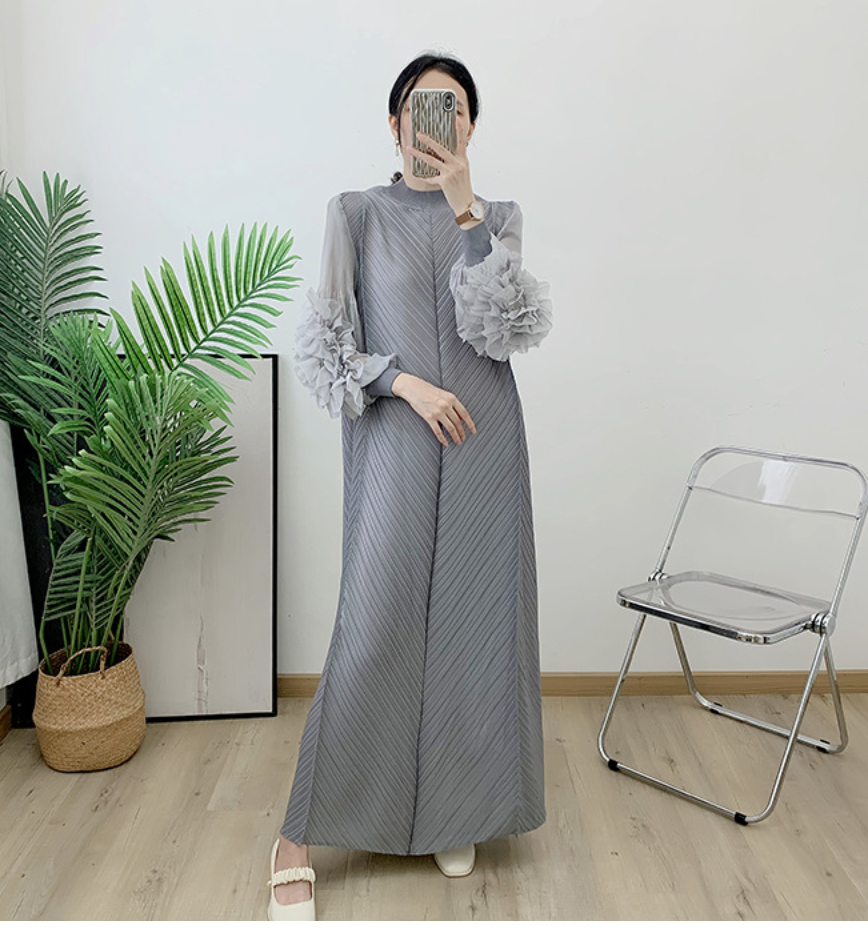 Pleated gown with 3D floral sleeves – Gerdie