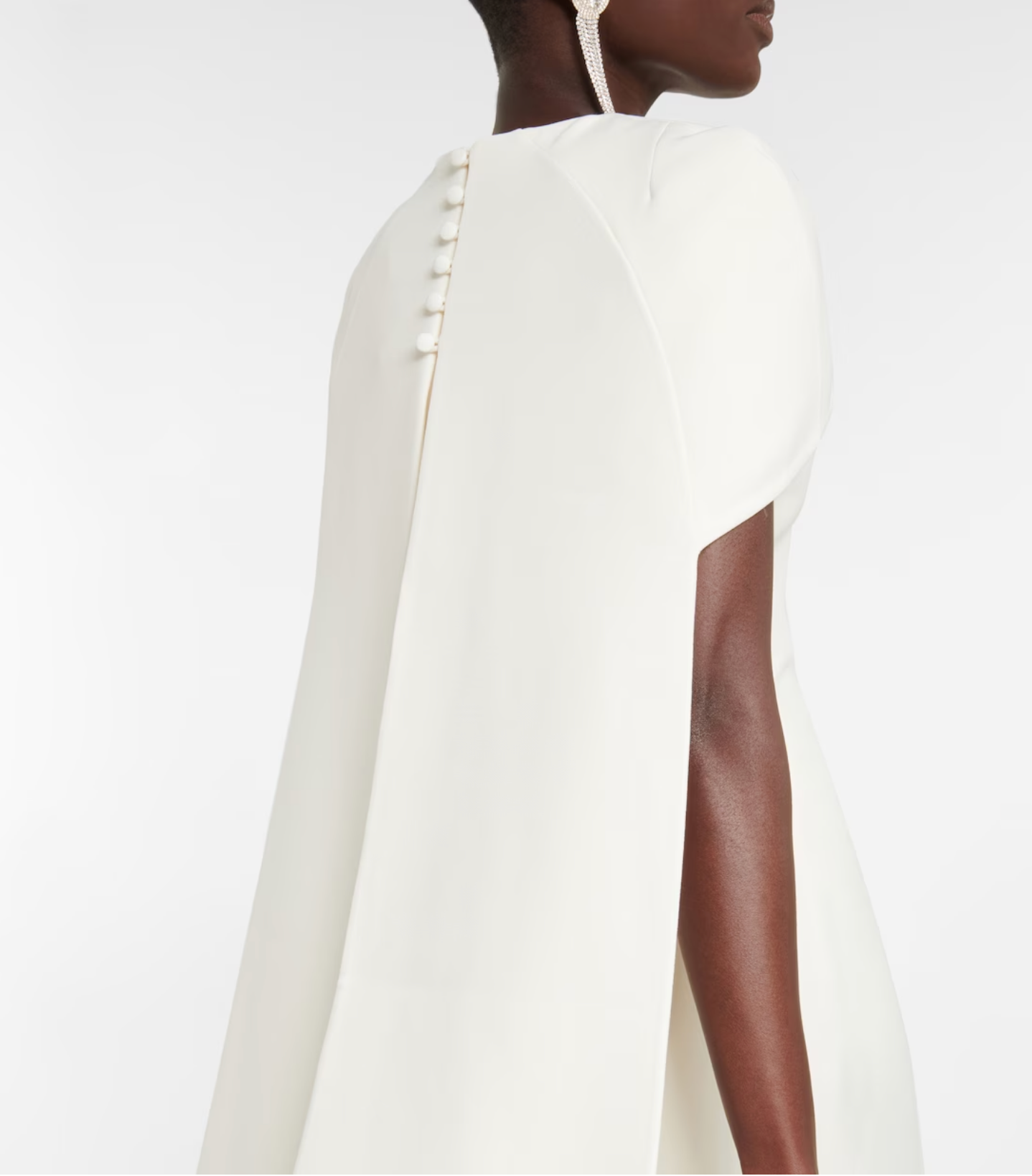 cape-back column gown with embellished neckline – Genaa
