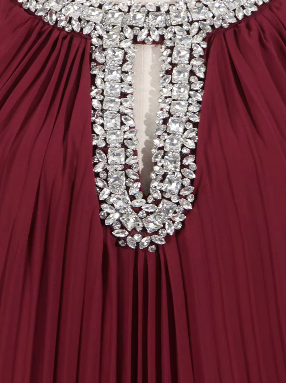 pleated gown with feather cuffs – Daren