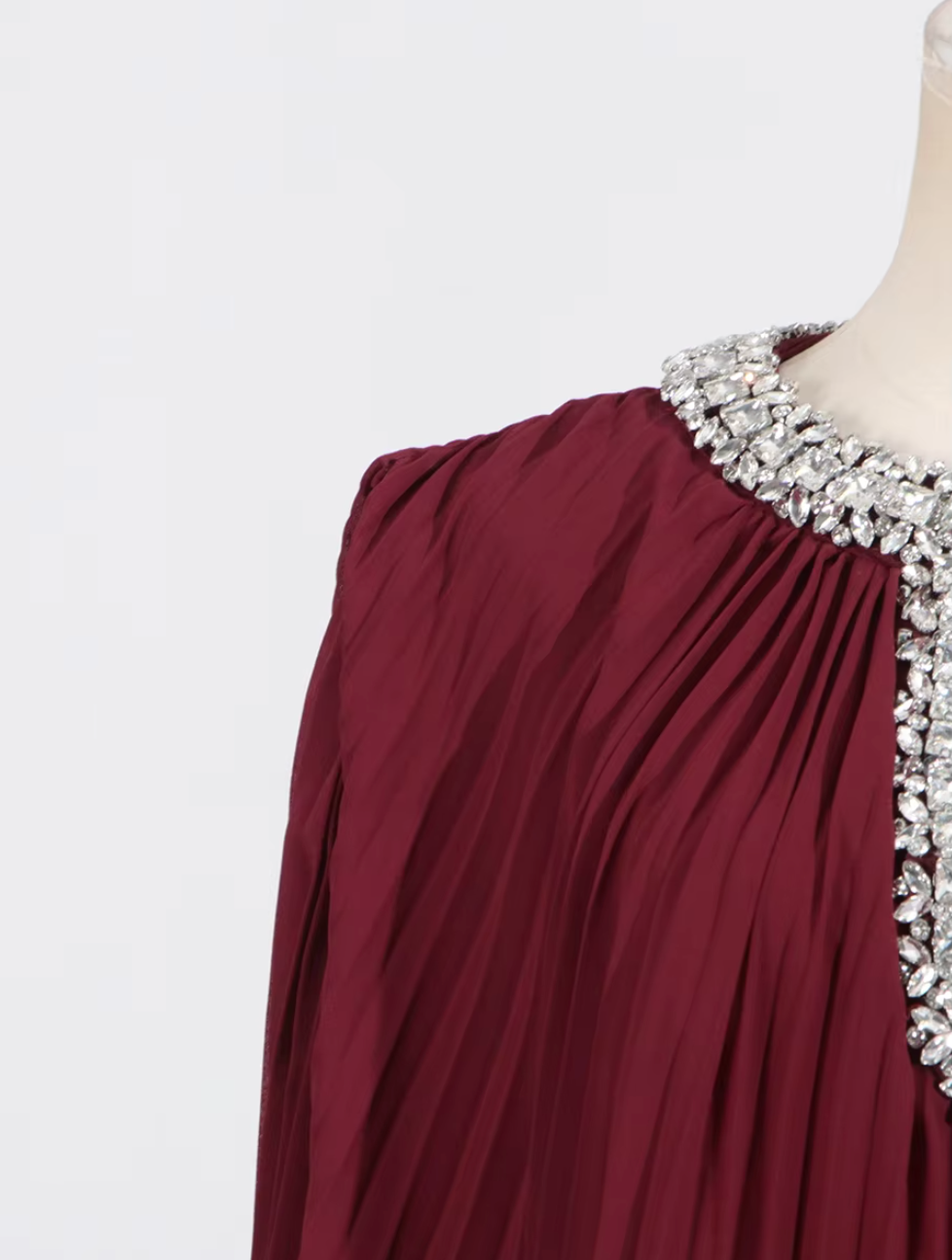 pleated gown with feather cuffs – Daren