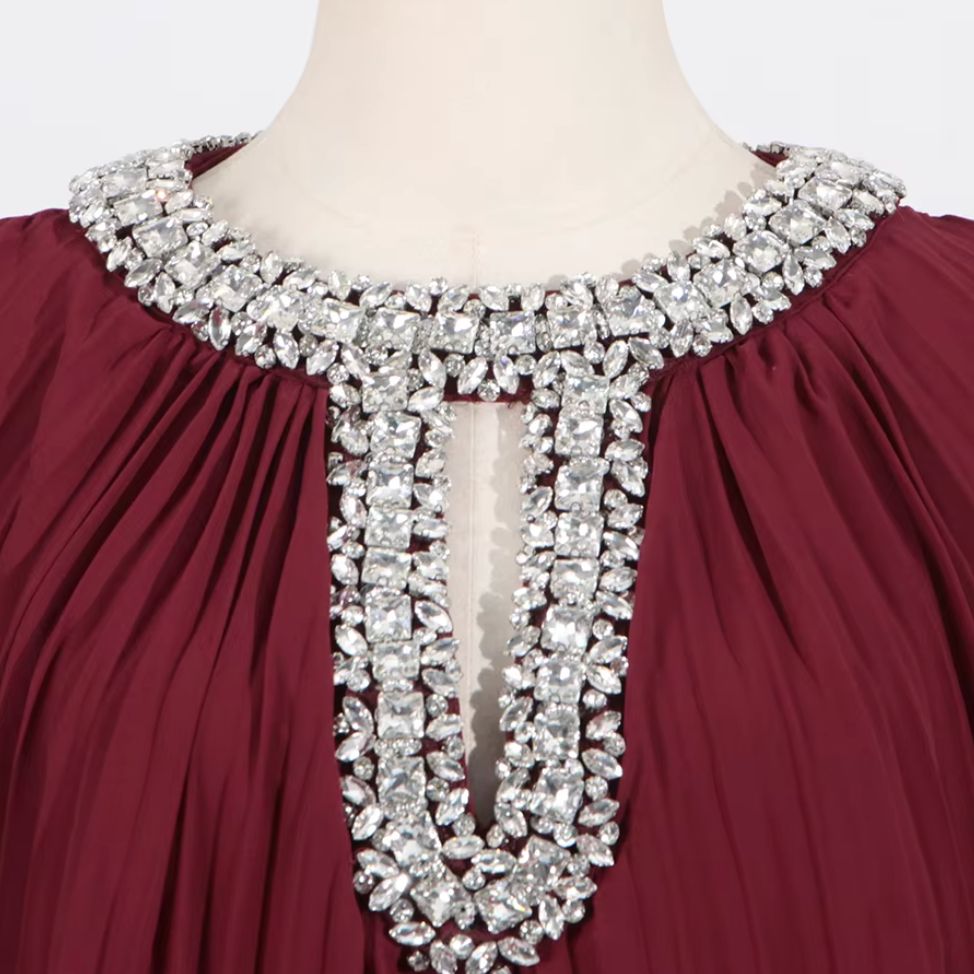 pleated gown with feather cuffs – Daren