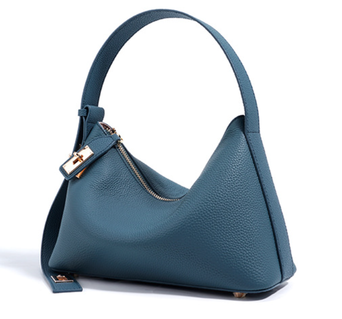 Sleek leather shoulder bag with bold hardware - Murti
