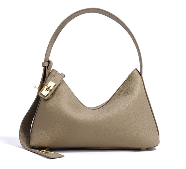 Sleek leather shoulder bag with bold hardware - Murti