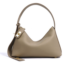 Sleek leather shoulder bag with bold hardware - Murti