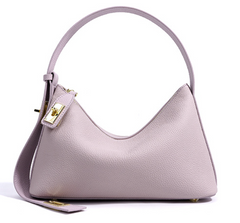 Sleek leather shoulder bag with bold hardware - Murti