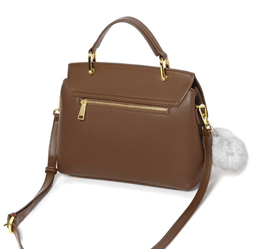 Structured handbag with gold hardware and pompom accent - Lilsy