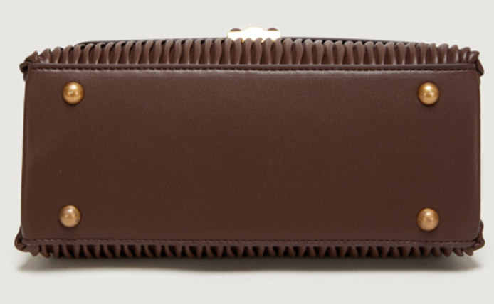 Pleated leather handbag with metal clasp - Lero
