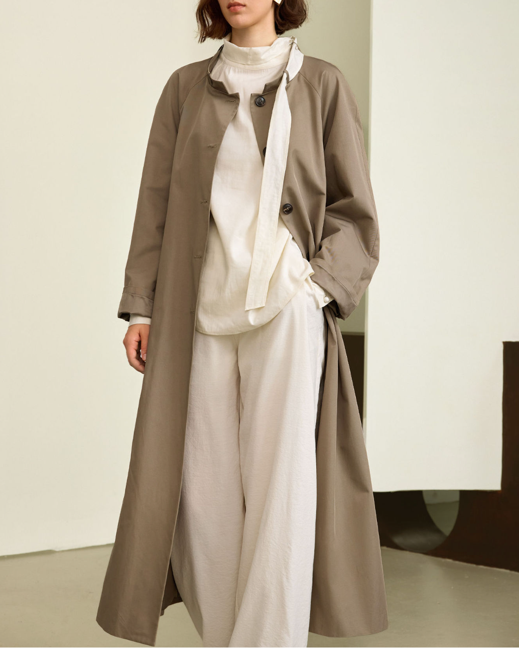 Longline buttoned coat with structured sleeves – Narwa