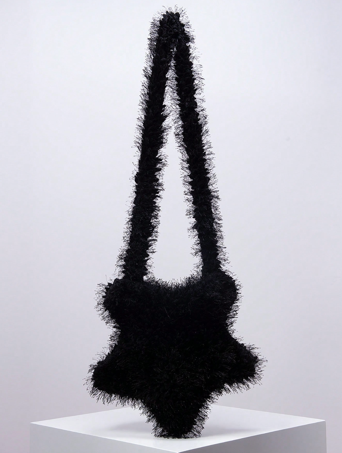 Star-shaped fuzzy shoulder bag with shaggy texture – Nunri