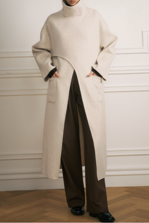 Asymmetric high-neck long coat with pocket detail – Dukaty