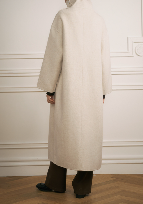 Asymmetric high-neck long coat with pocket detail – Dukaty