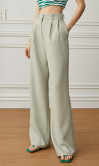 High-waisted tailored pants with front pleats - Nudvi