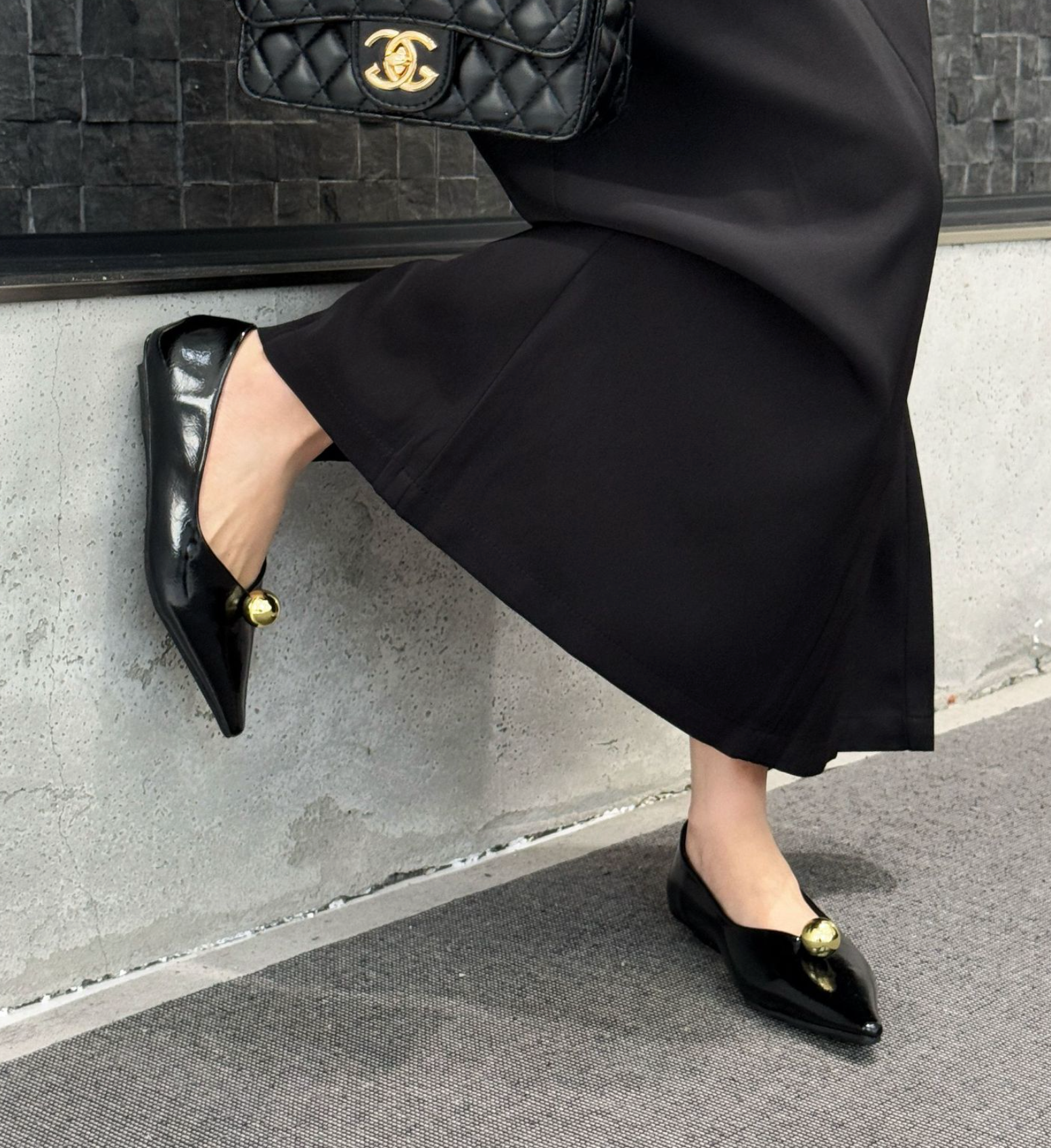 pointed black flats with gold dome detail - VEIRA