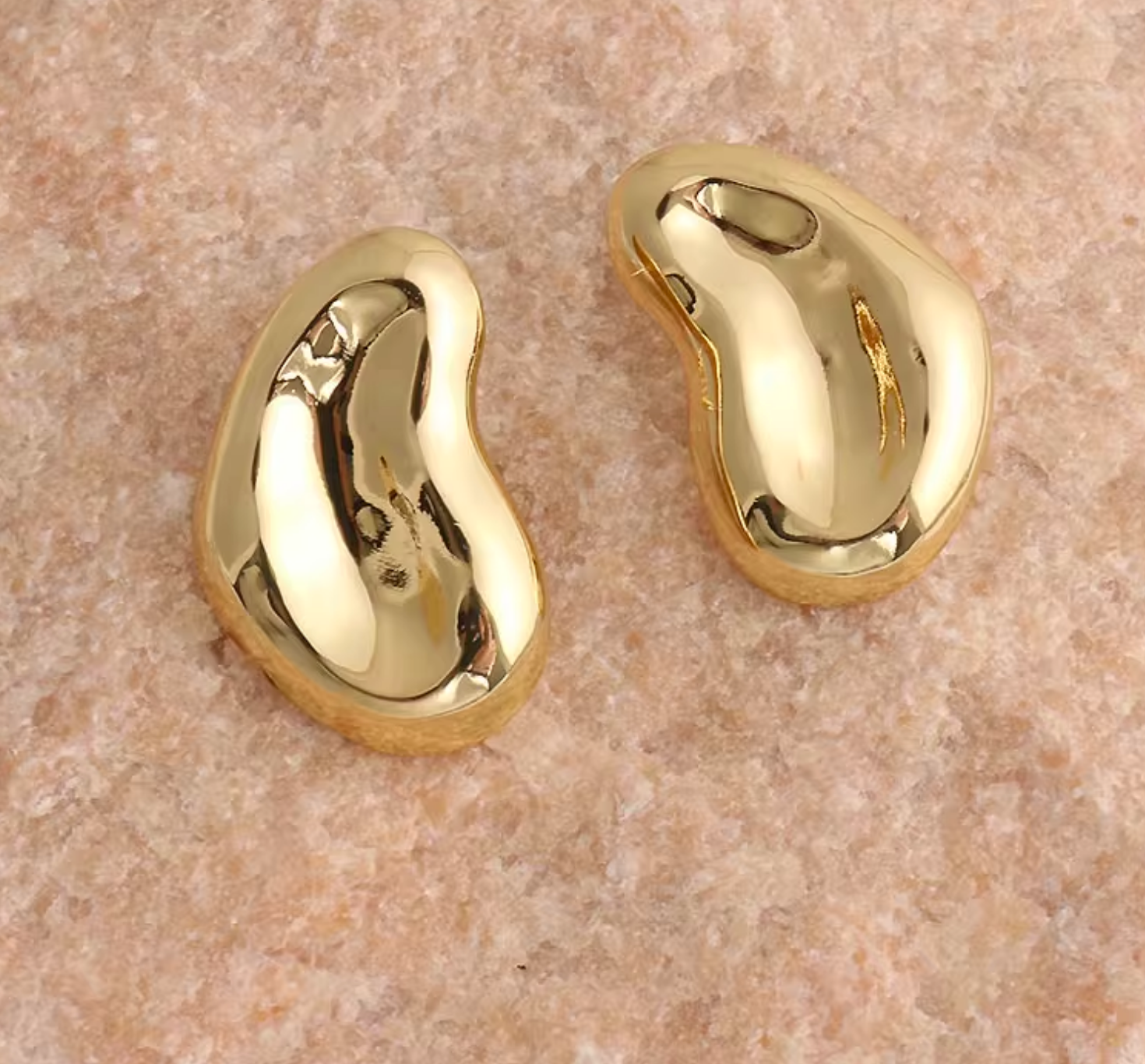 Sculptural folded earrings with abstract silhouette - Rolmi