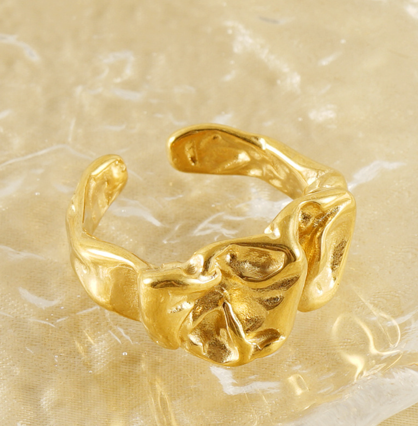 sculpted wave hoop earrings with gold finish - NORA