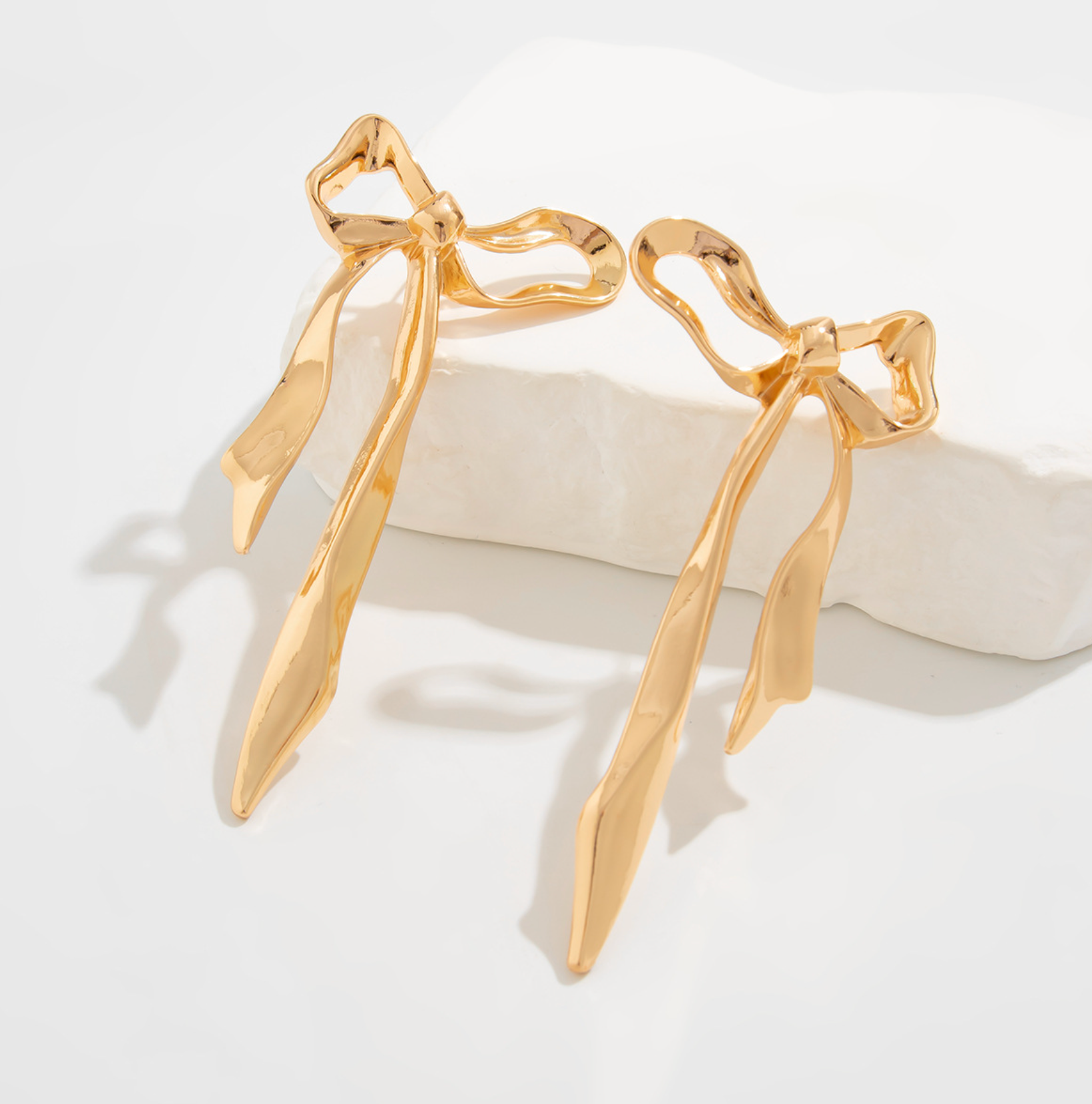 ribbon-shaped drop earrings with bow design – LUXA