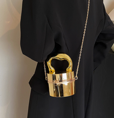 metallic dome clutch bag with sculptural handle – NOVQA