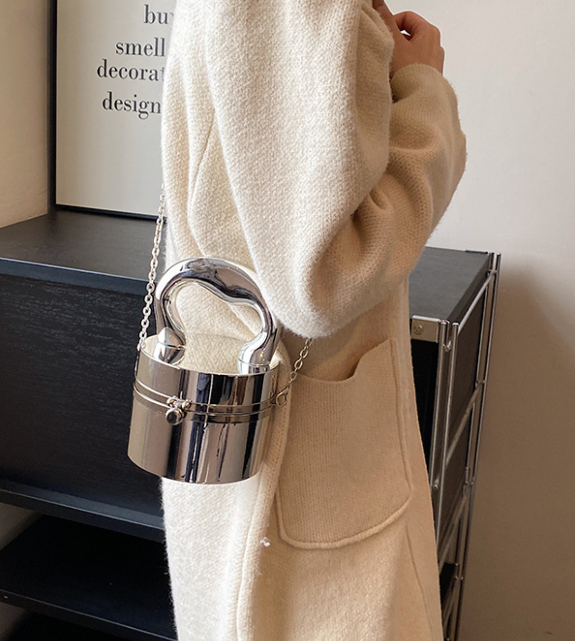 metallic dome clutch bag with sculptural handle – NOVQA