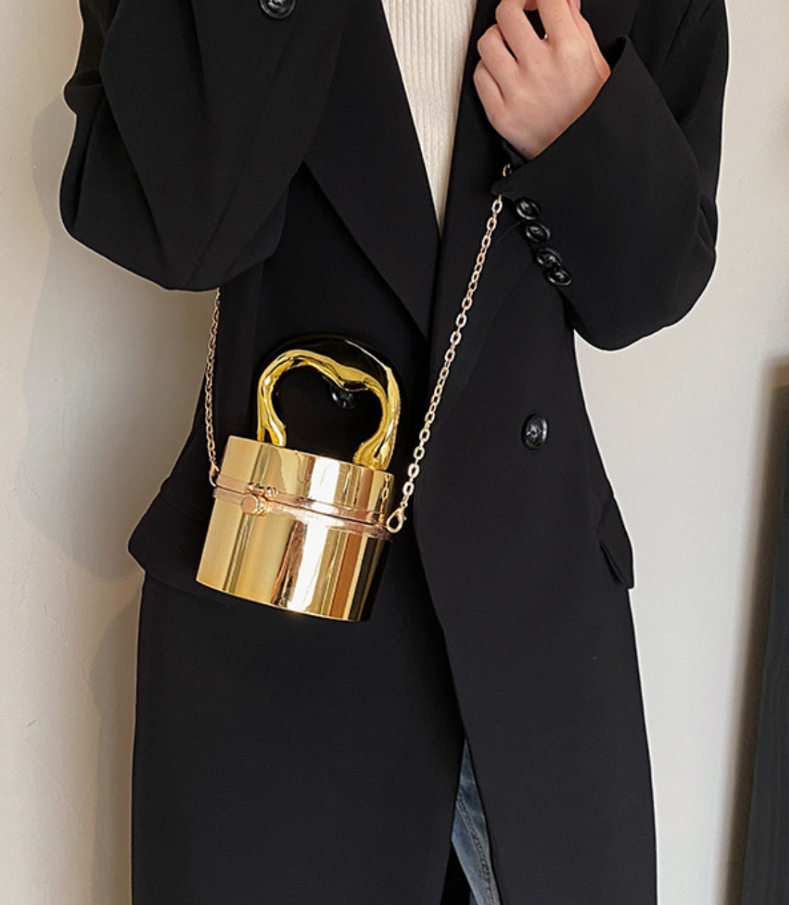 metallic dome clutch bag with sculptural handle – NOVQA
