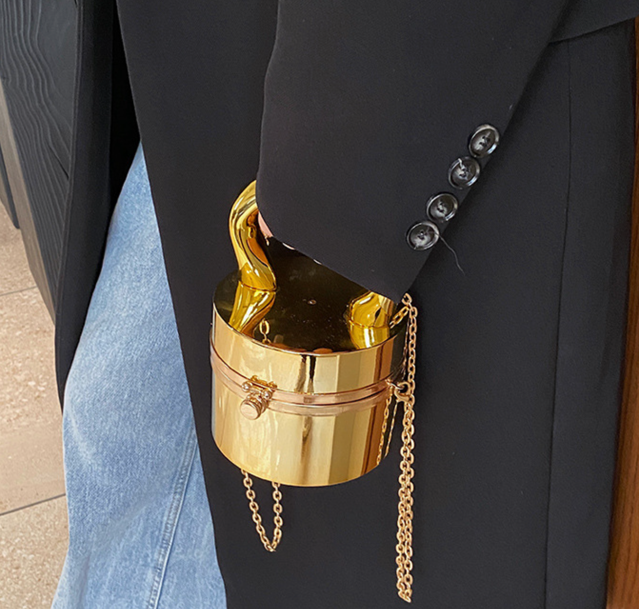 metallic dome clutch bag with sculptural handle – NOVQA