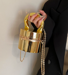 metallic dome clutch bag with sculptural handle – NOVQA