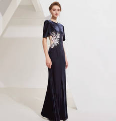 Velvet gown with sequin floral burst and padded shoulders – ASTRIA