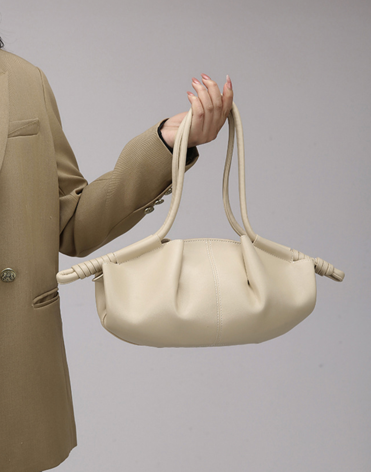ruched crescent bag with knotted handles – NYRA