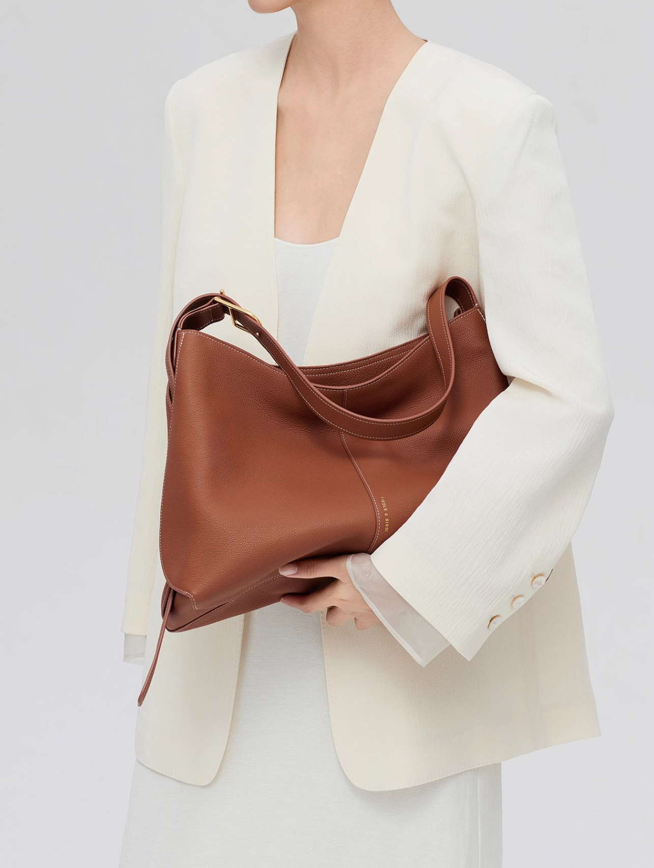 sculpted wristlet hobo bag in saddle brown – LAYNA