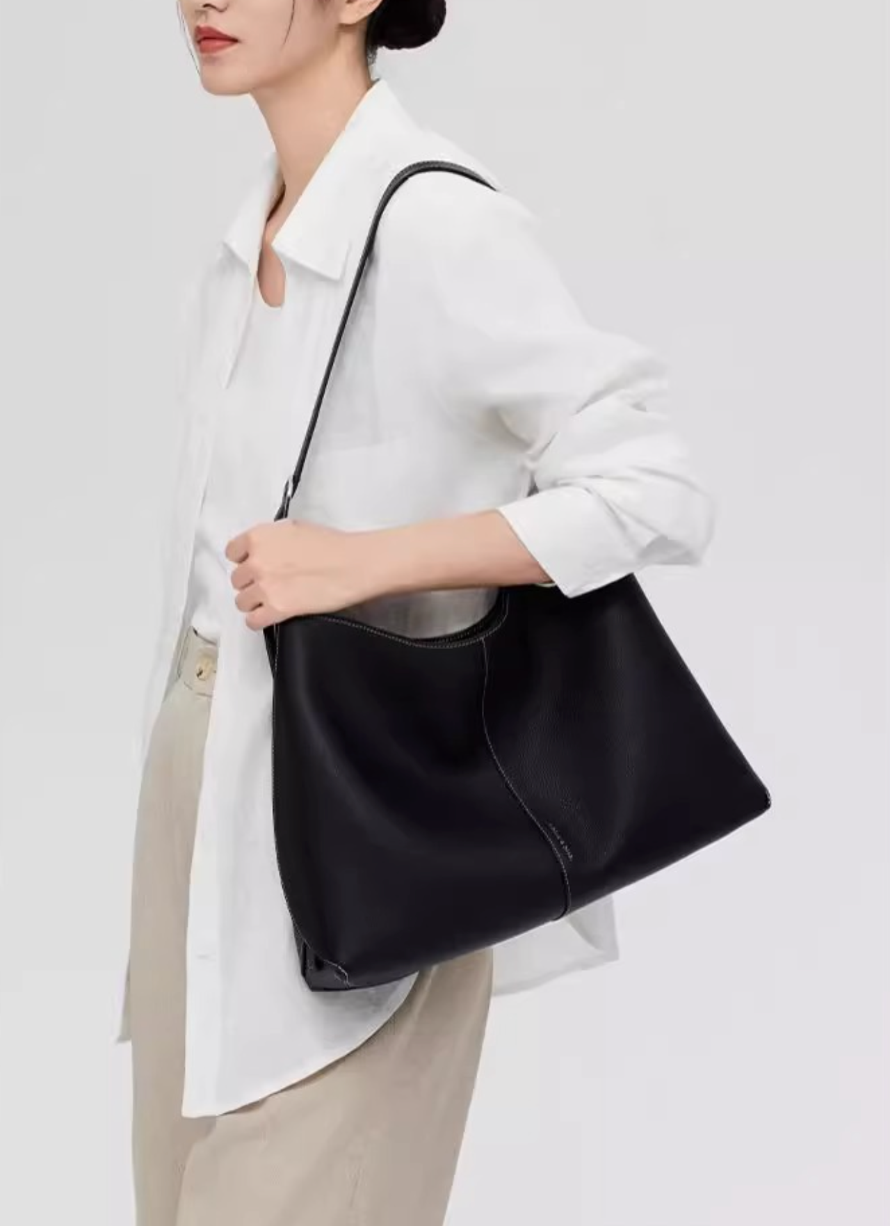 sculpted wristlet hobo bag in saddle brown – LAYNA