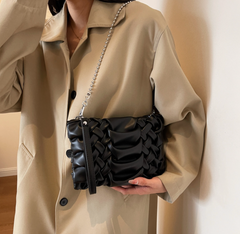 woven clutch with sculpted leather detail – FAYE
