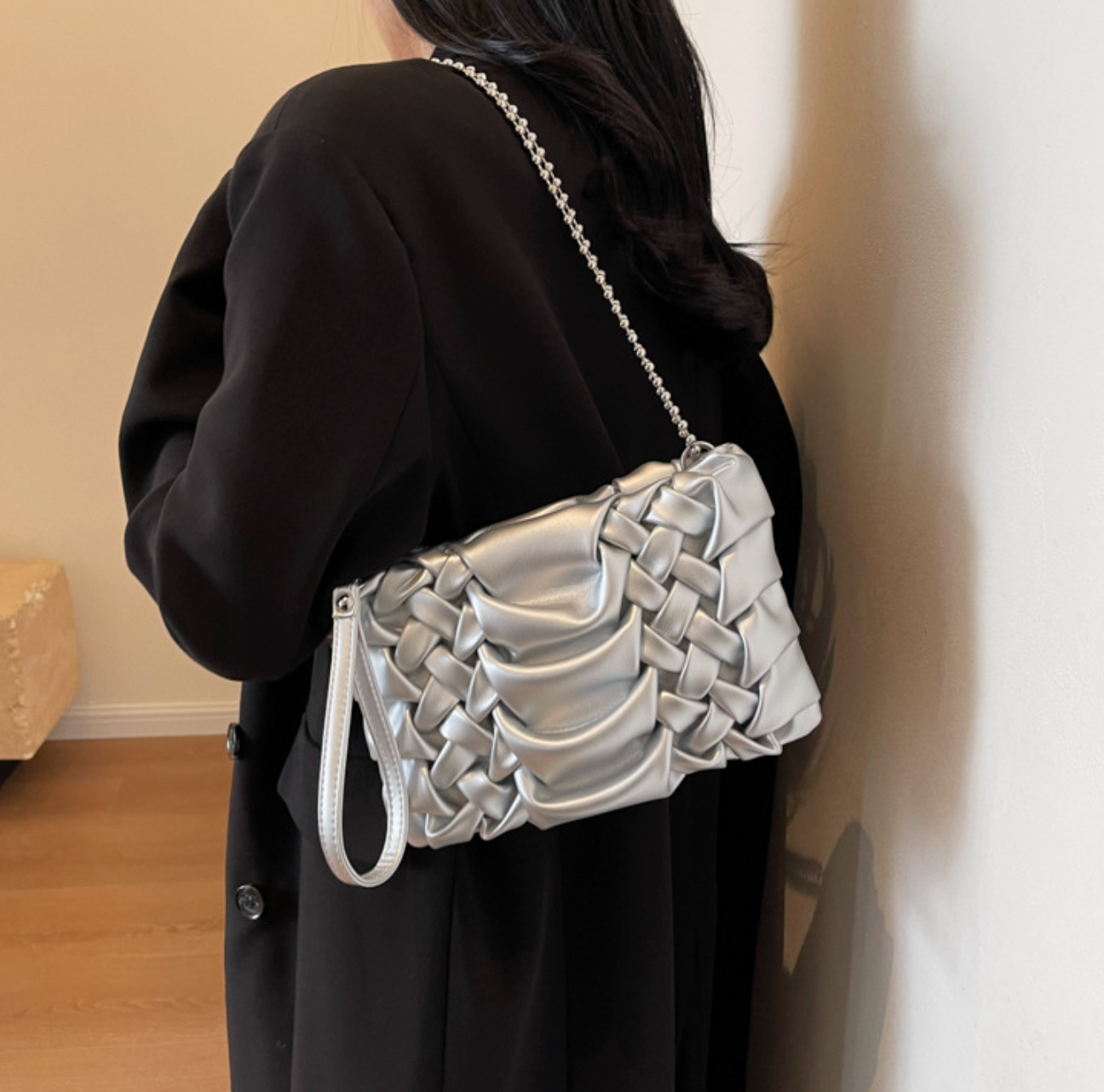 woven clutch with sculpted leather detail – FAYE