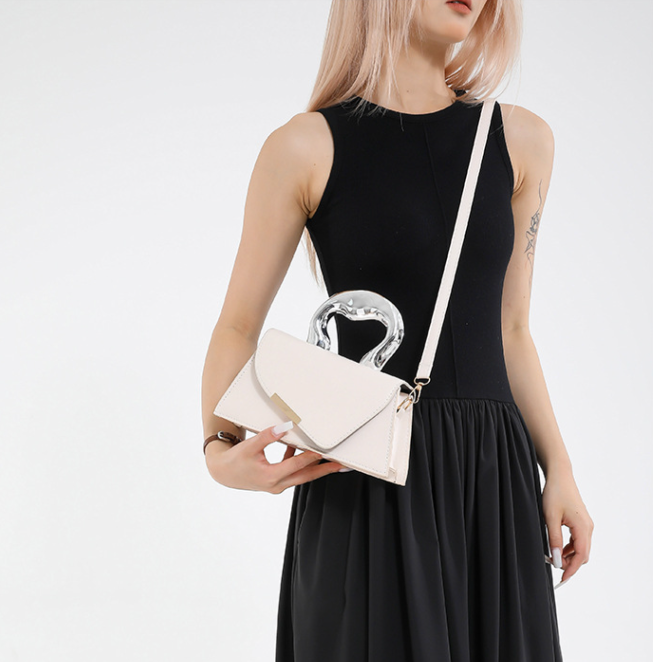 heart-handle mini bag with geometric flap – LEXIE