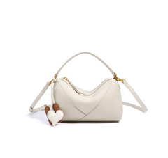 curved shoulder bag with contrast charm detail – MIIRA