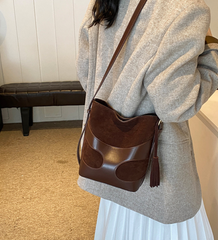suede bucket bag with curved leather trim – RUBY