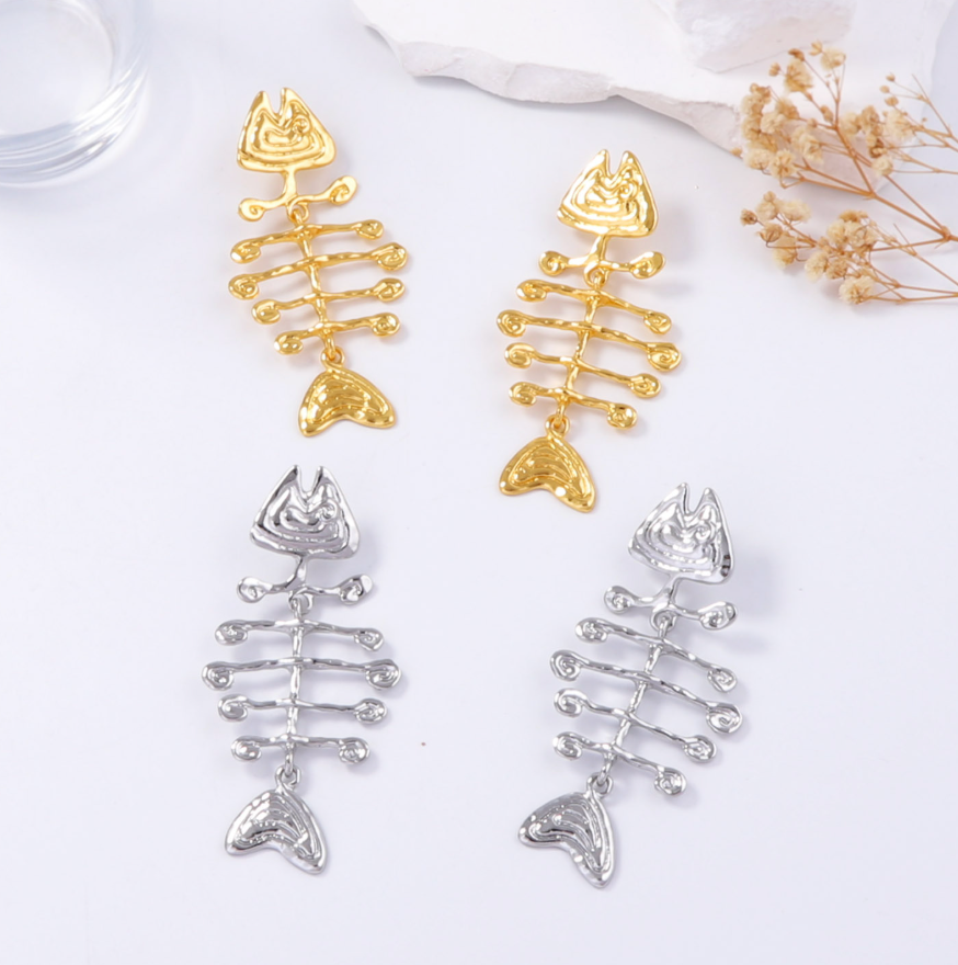 geometric statement earrings with tribal fishbone motif – ORA