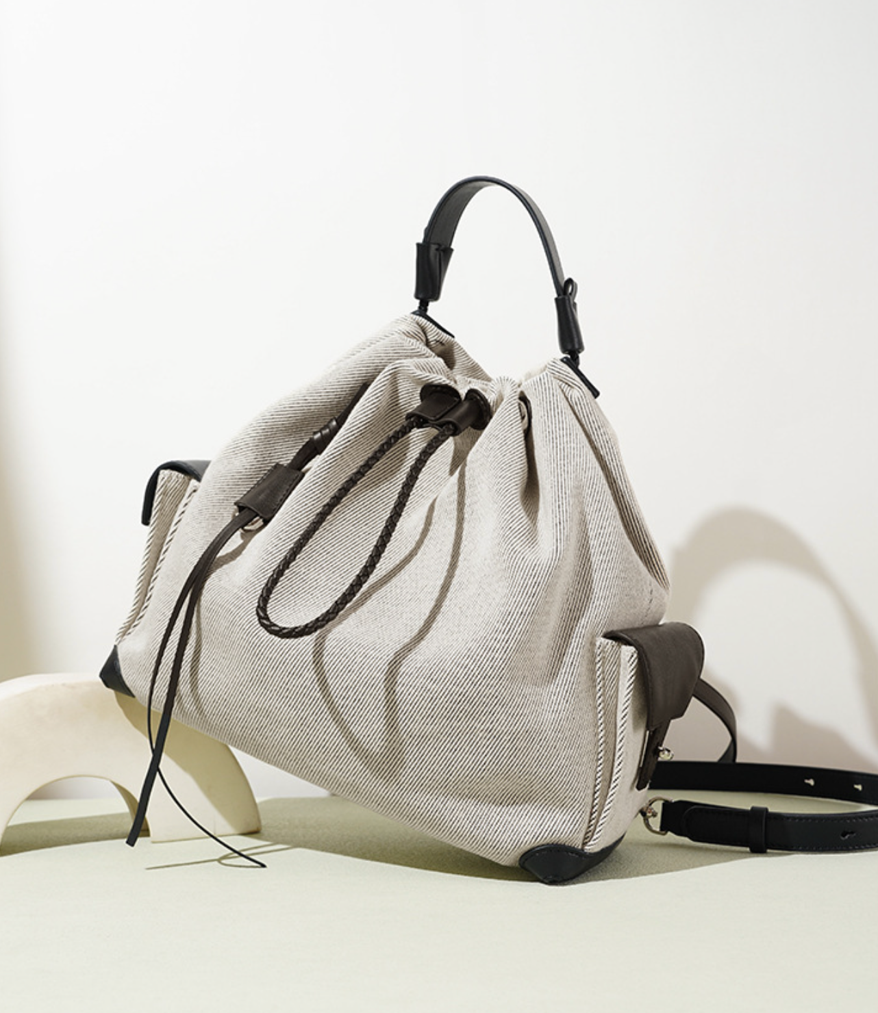 striped canvas drawstring bucket bag with leather trims – NOIIR