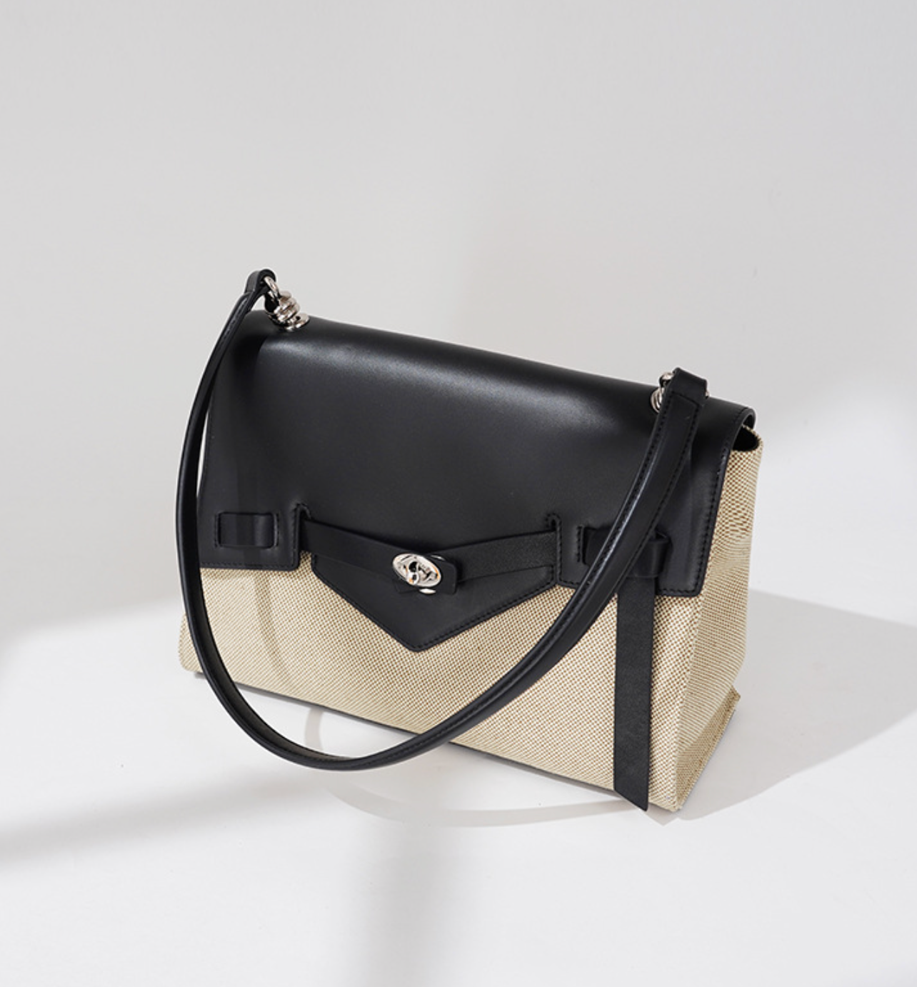 contrast flap structured handbag with knot detail – NEVAL